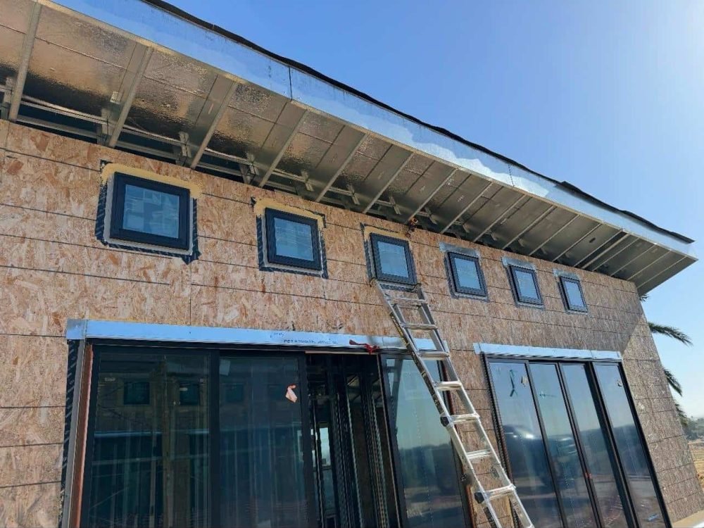 Custom metal roofing and cladding installation at a commercial building.